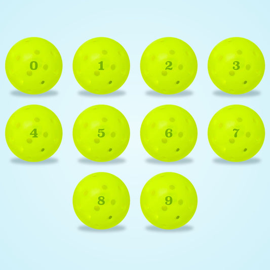 Dink Ink Number Stamper: 0, 1, 2, 3, 4, 5, 6, 7, 8, 9 stamped on pickleballs