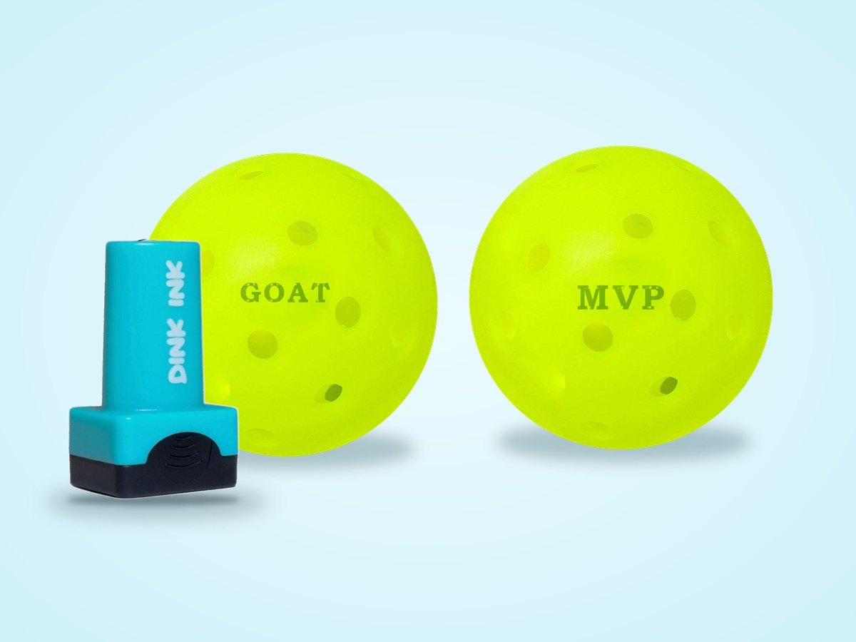 Pickleballs stamped GOAT and MVP