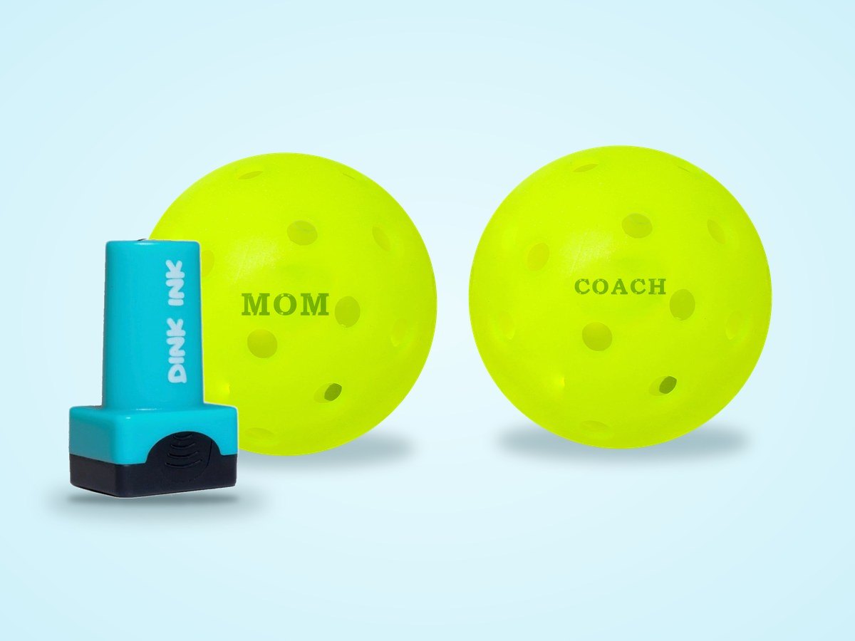 Pickleballs stamped MOM and COACH