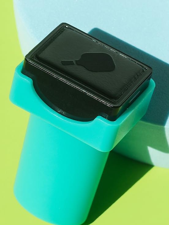 A Dink Ink stamper with its cap off